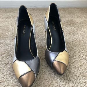 Nine west Metallic Pumps.
